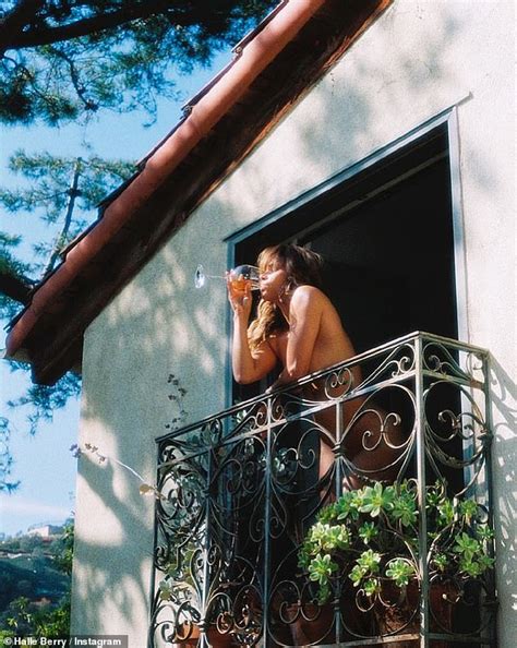 halle berry enjoyed a glass of wine in the nude.|Halle Berry Poses Nude While Drinking Wine on Her Balcony